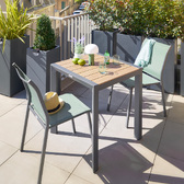 Garden table set ÉVASION Honey & Graphite and 2 stackable chairs ESSENTIA 1 garden table for 2 seats and 2 stackable chairs Honey / Graphite